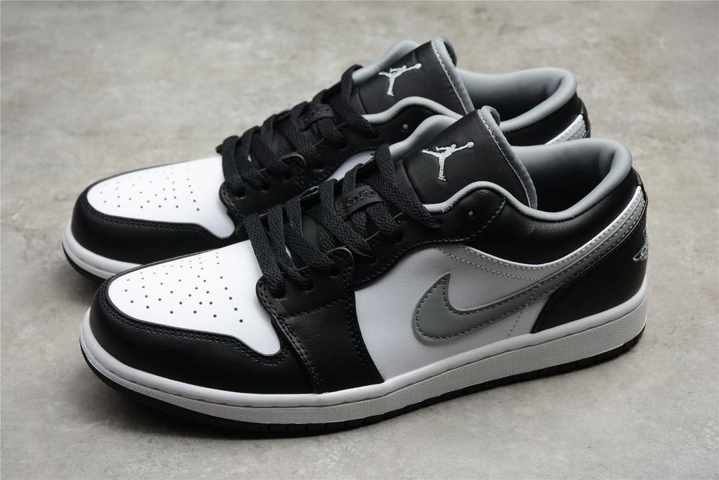 Jordan 1 Low – Negro / Blanco / Gris