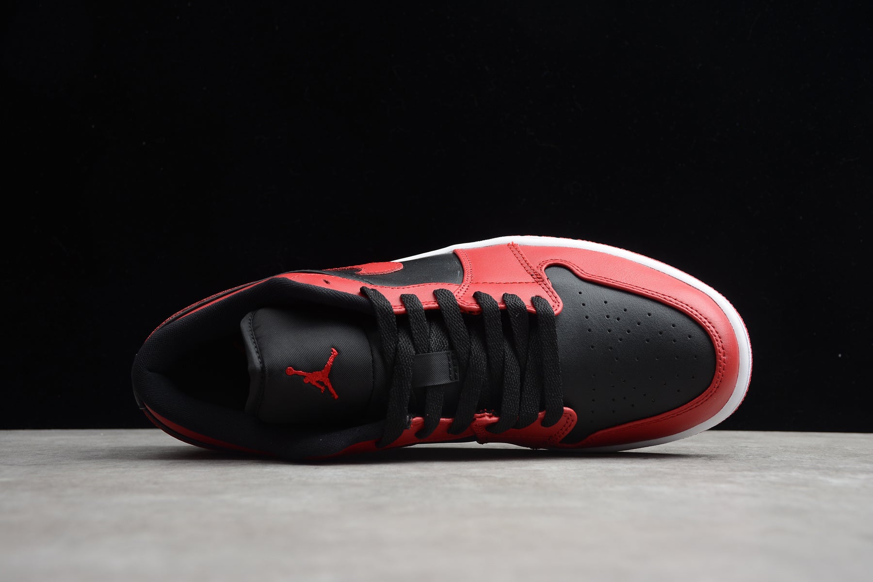 Jordan 1 Low – Rojo / Negro
