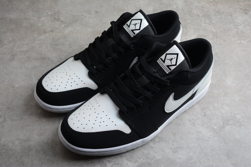 Jordan 1 Low – Negro / Blanco