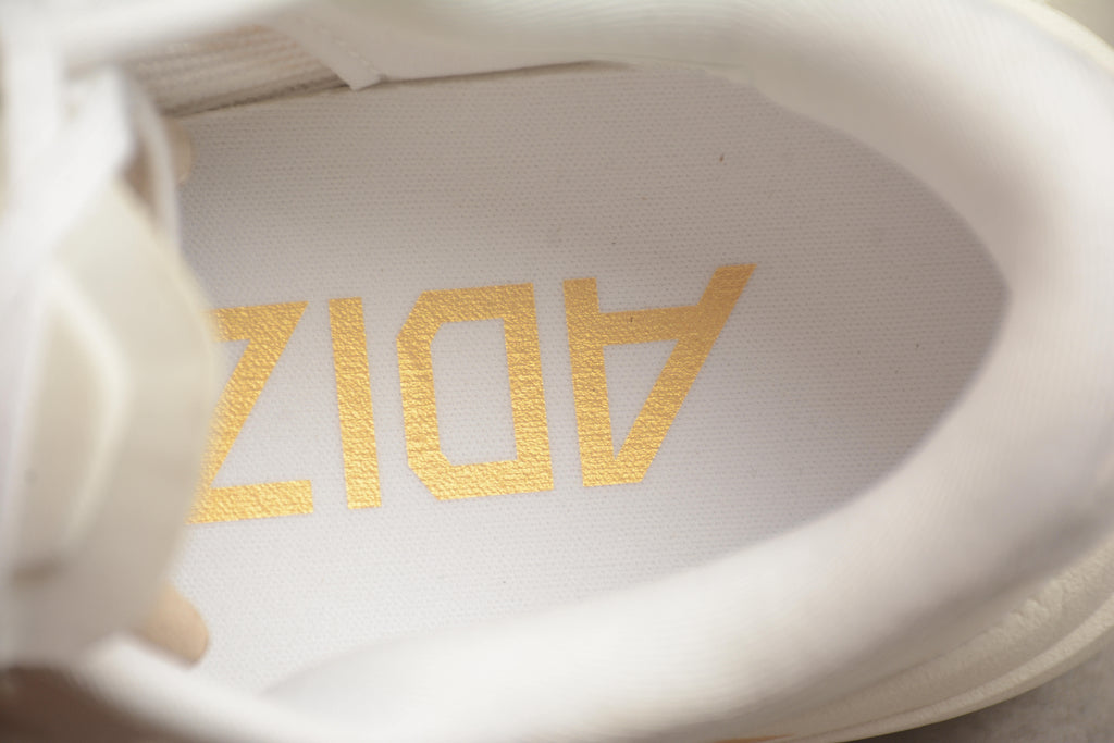 Adidas Adizero Evo SL – Blanco / Dorado