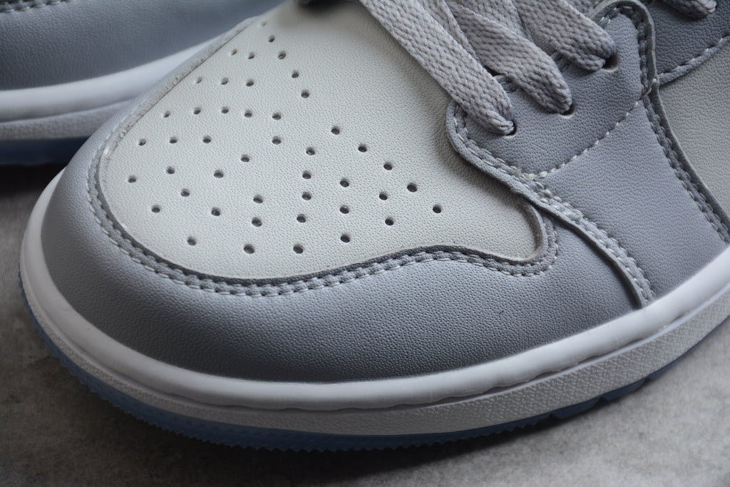 Jordan 1 Low – Beige / Blanco / Negro