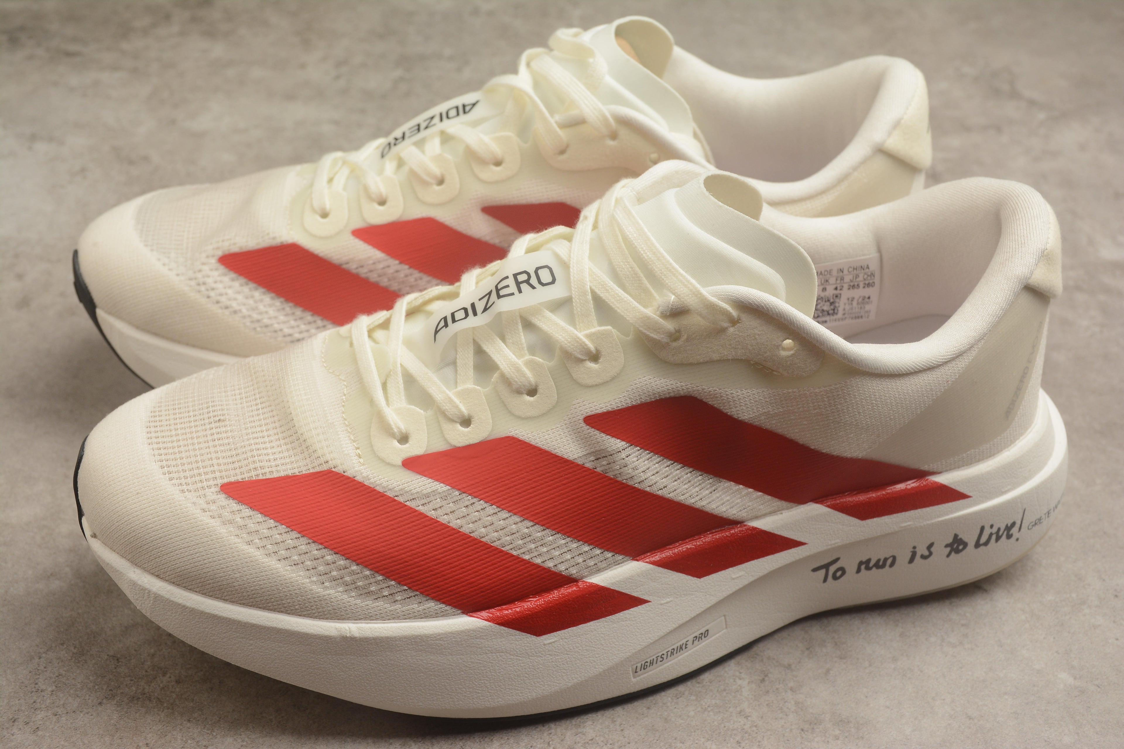 Adidas Adizero Evo SL – Blanco / Rojo