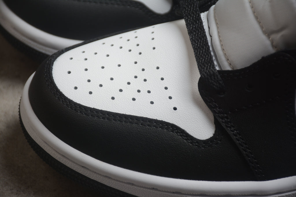 Air Jordan 1 Mid – Negro / Blanco