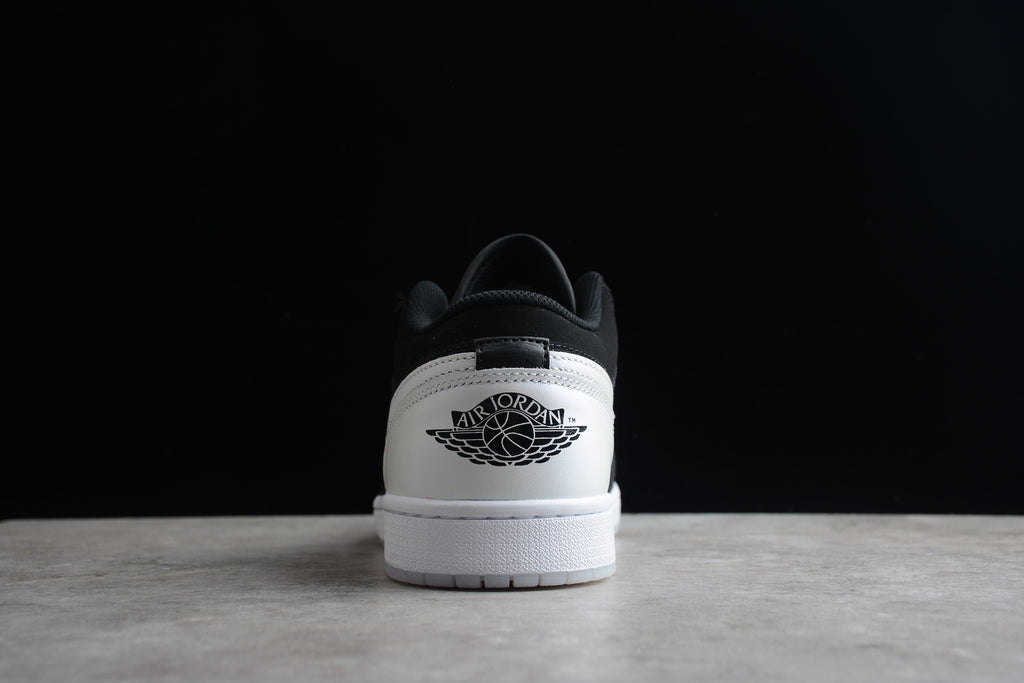 Jordan 1 Low – Negro / Blanco