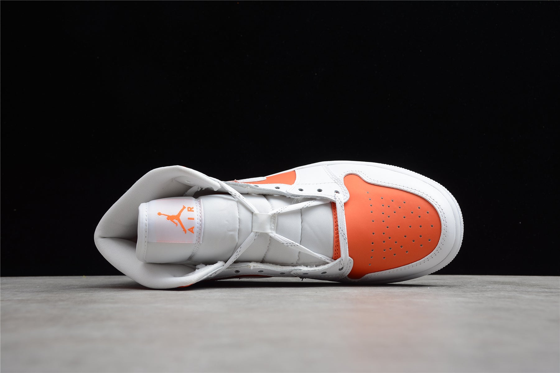 Air Jordan 1 Mid – Blanco / Naranja