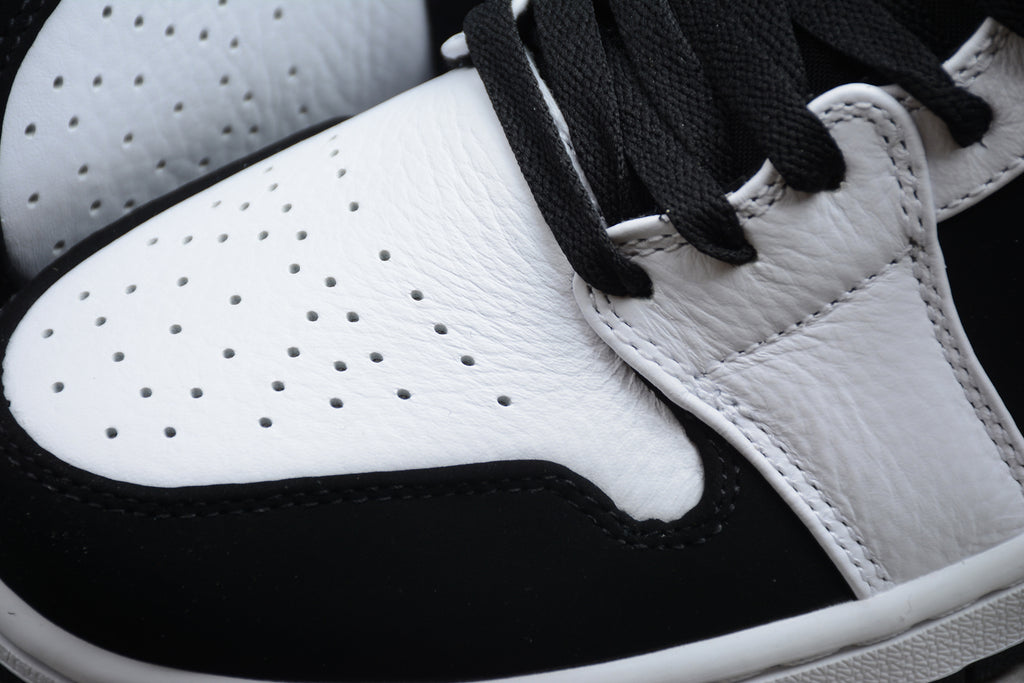 Air Jordan 1 Mid – Blanco / Negro