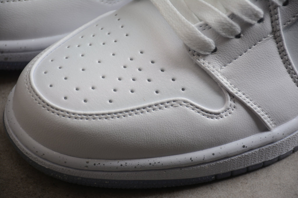 Jordan 1 Low – Blanco / Gris