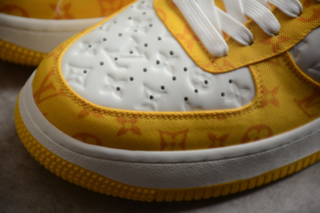 Air Force 1 Low LV – Blanco / Amarillo