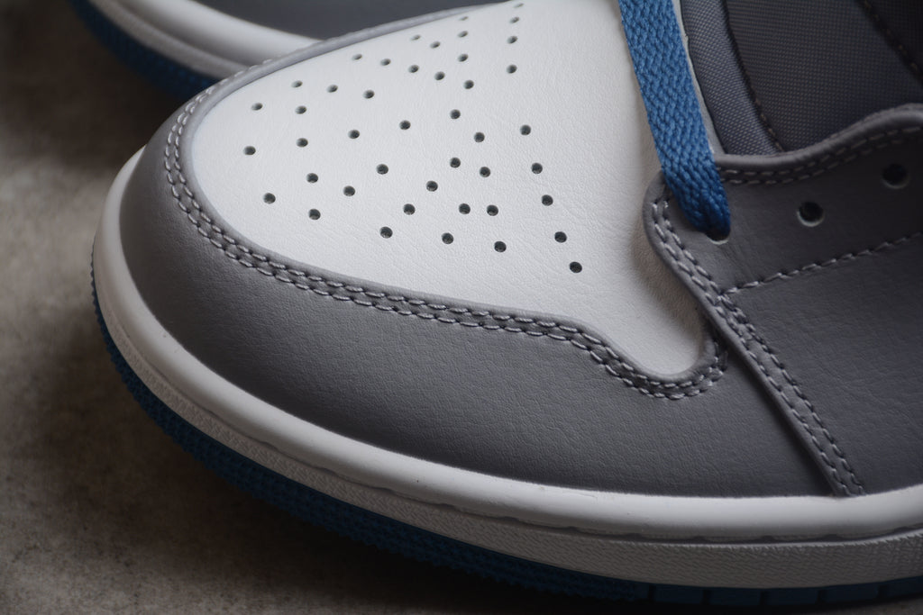 Air Jordan 1 Mid – Blanco / Gris