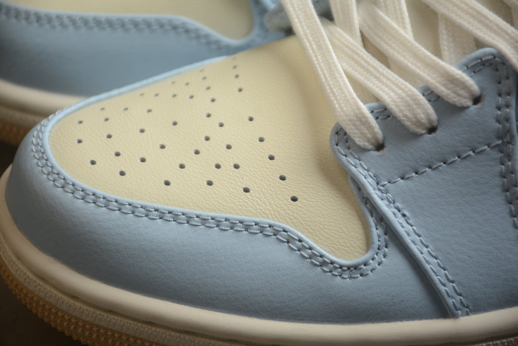 Jordan 1 Low – Beige / Azul