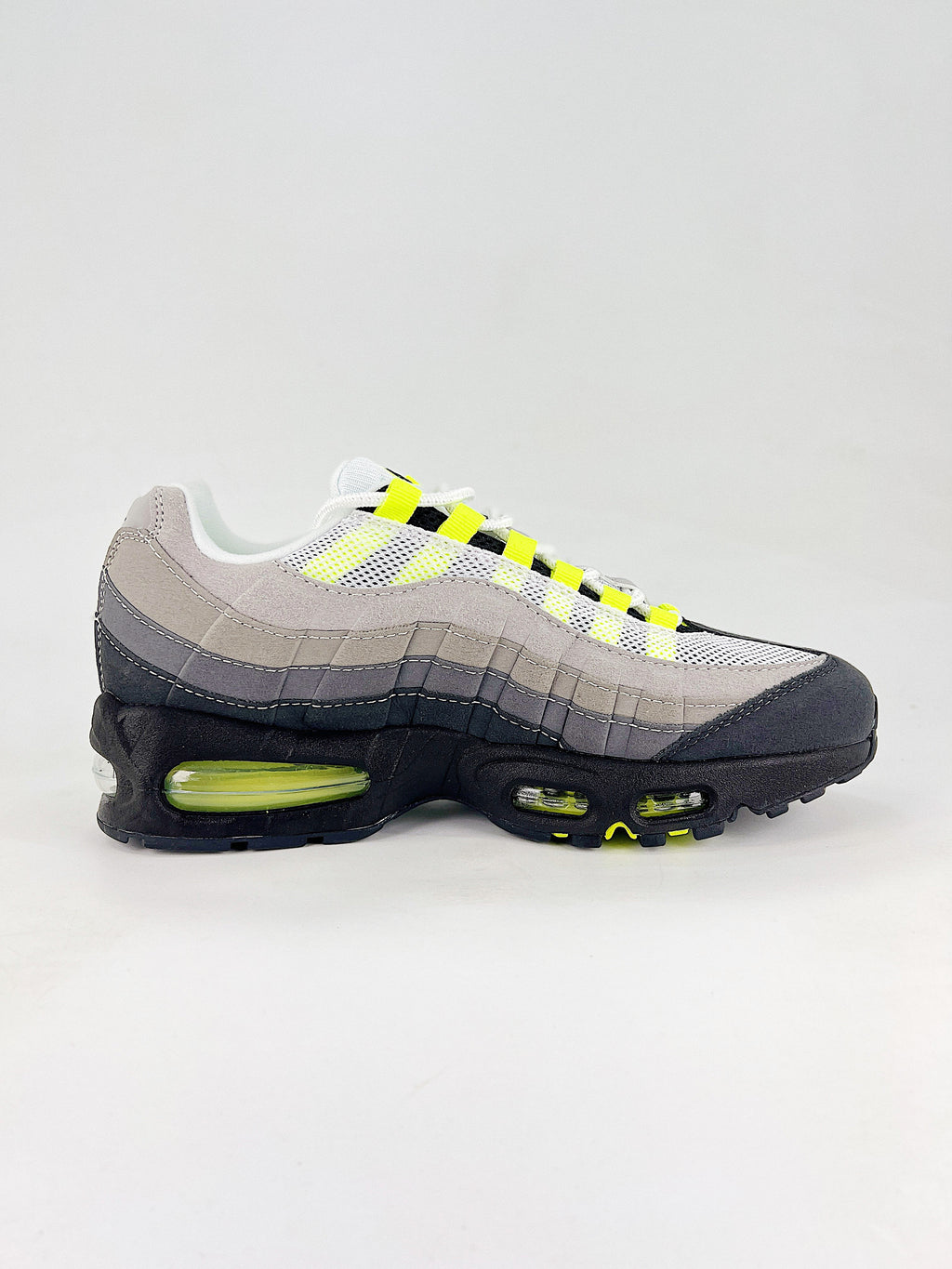 Air Max 95 – Negro / Gris / Amarillo
