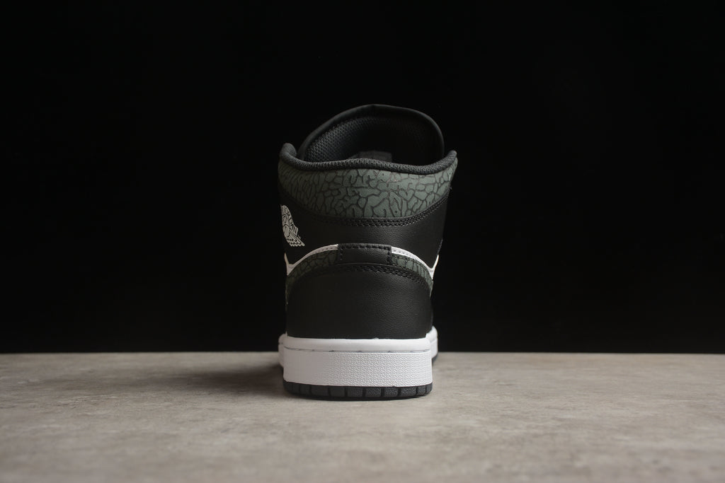 Air Jordan 1 Mid – Negro / Blanco