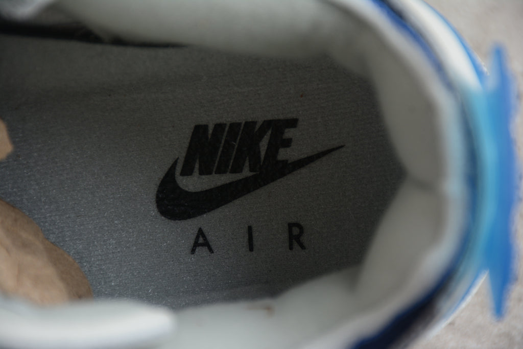 Air Jordan 4 – Gris / Azul