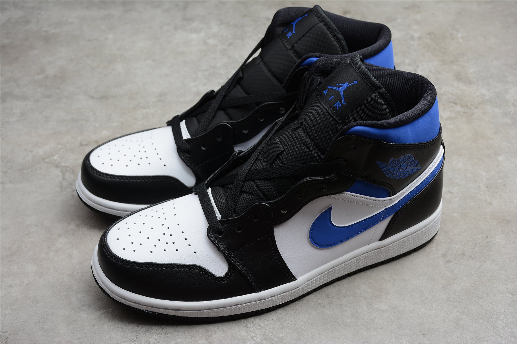 Air Jordan 1 Mid – Negro / Azul
