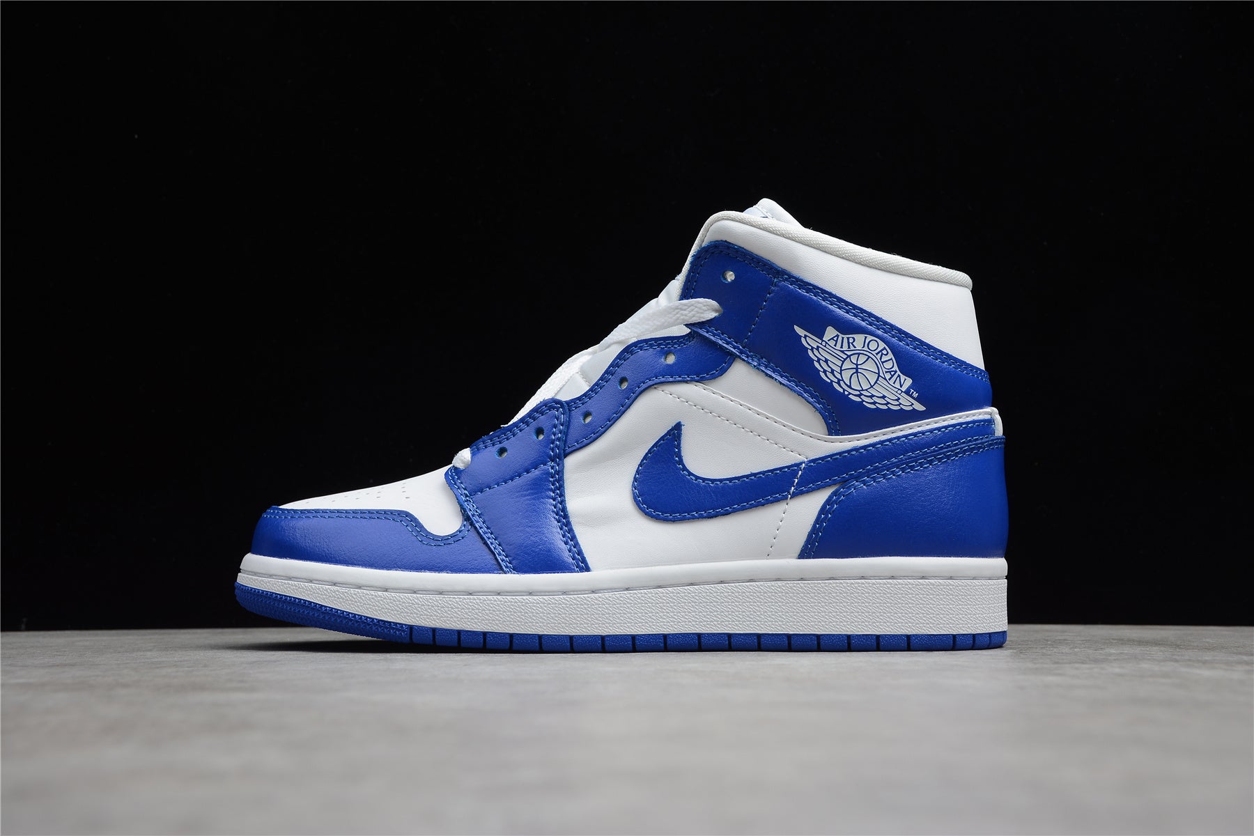 Air Jordan 1 Mid – Azul Oscuro / Blanco