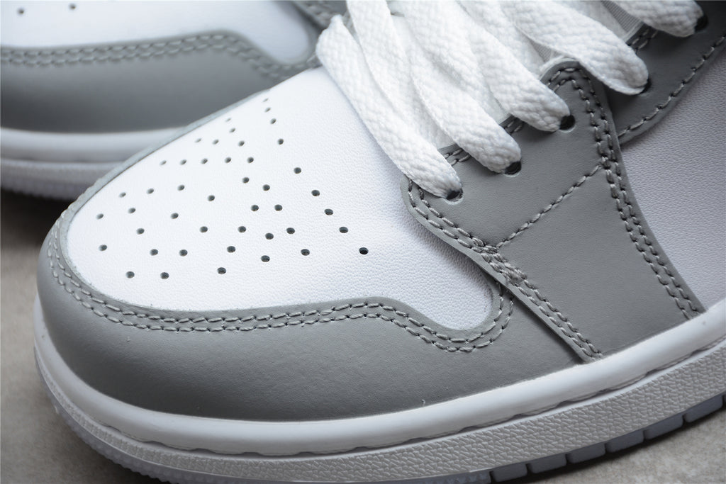 Air Jordan 1 Mid – Gris / Azul