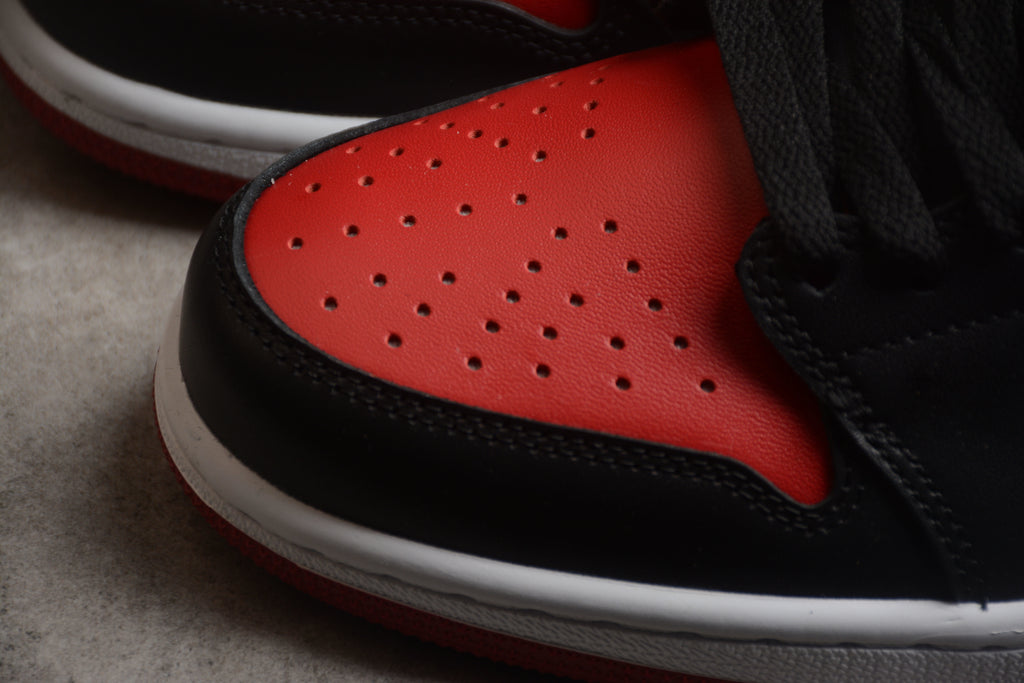 Jordan 1 Low – Negro / Azul / Rojo