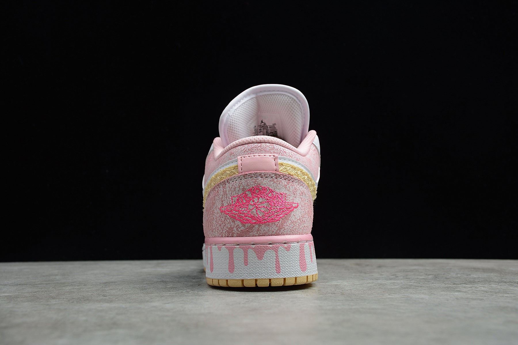 Jordan 1 Low – Rosa / Blanco / Negro