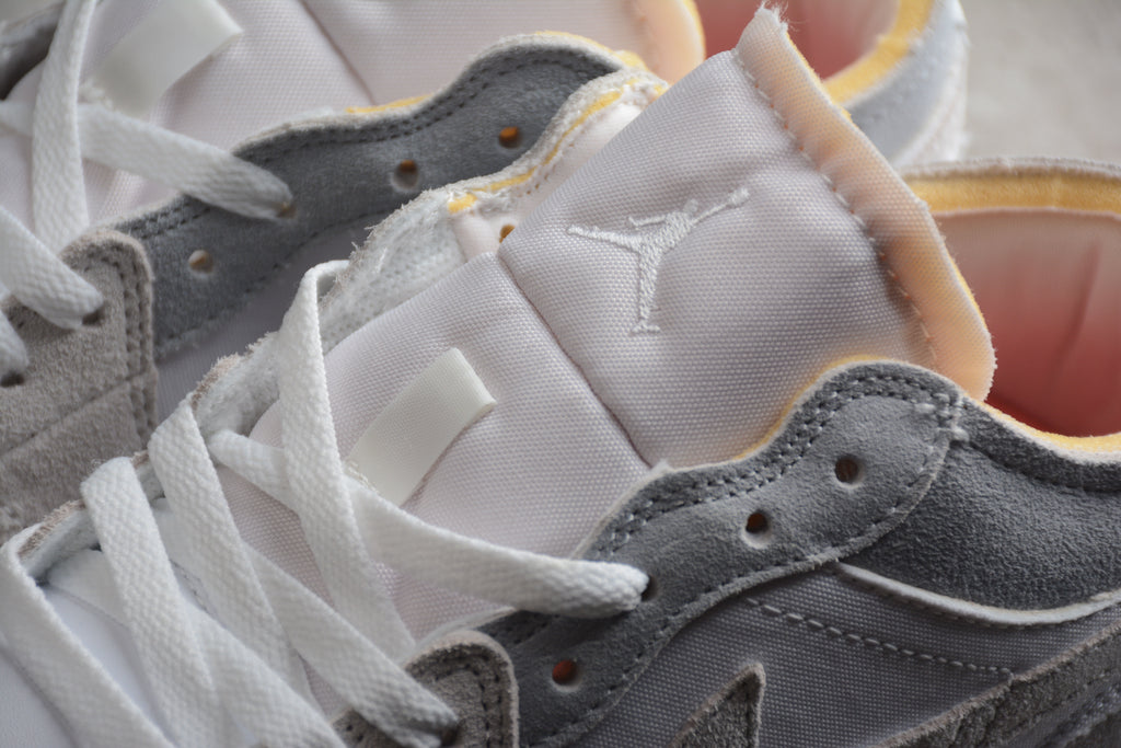 Jordan 1 Low – Gris / Blanco