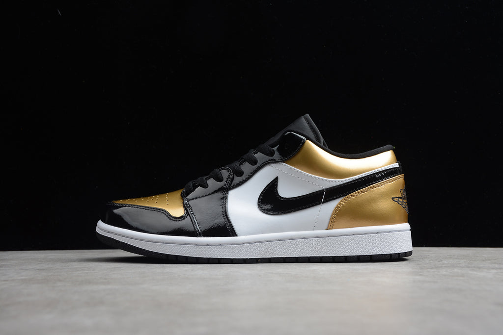 Jordan 1 Low – Negro / Dorado