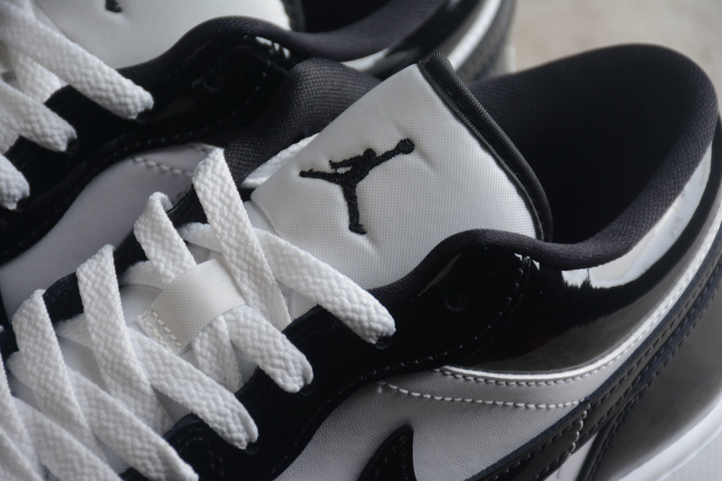 Jordan 1 Low – Negro / Blanco Brillante