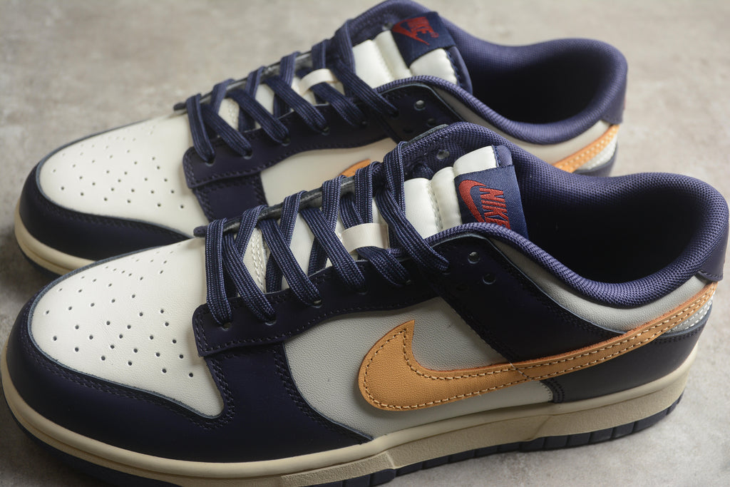 Dunk SB – Azul Oscuro / Blanco / Amarillo