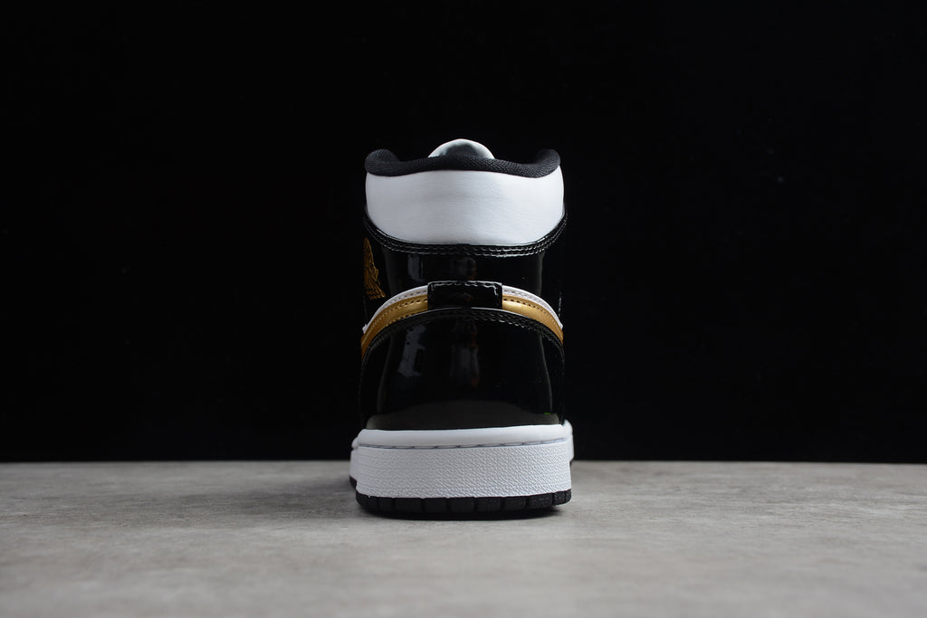 Air Jordan 1 Mid – Negro / Dorado