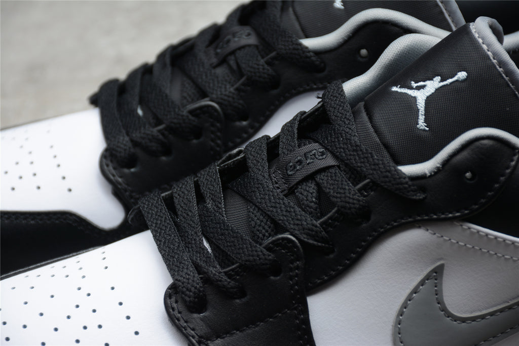 Jordan 1 Low – Negro / Blanco / Gris