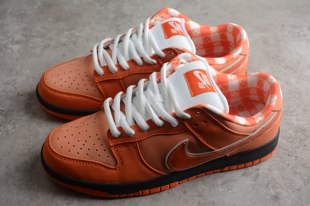 Dunk SB – Naranja / Blanco / Negro