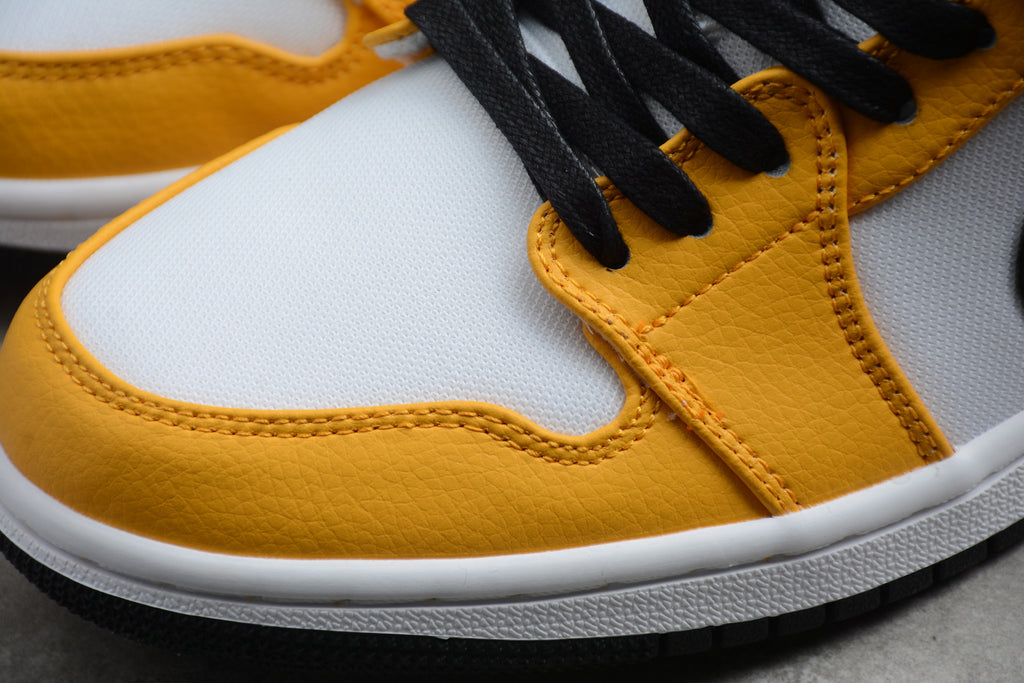 Jordan 1 Low – Amarillo / Blanco
