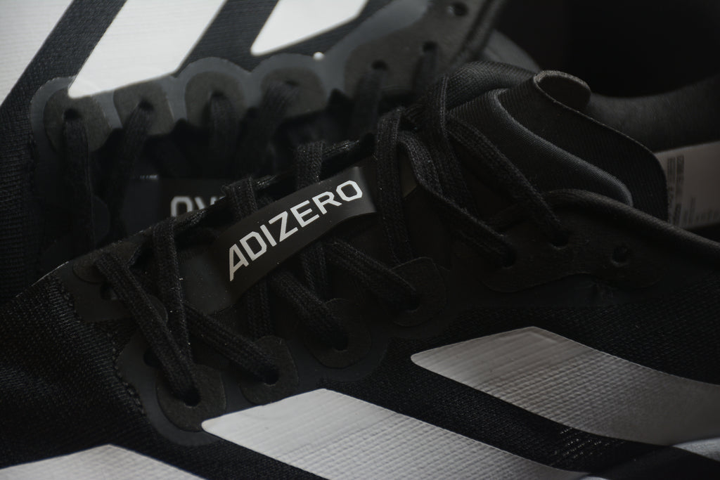 Adidas Adizero Evo SL – Negro / Blanco