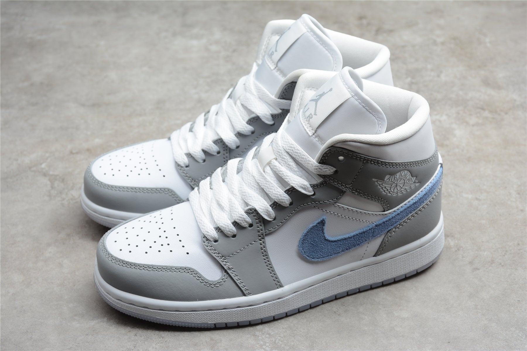 Air Jordan 1 Mid – Gris / Azul