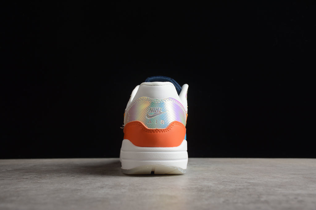 Air Max 1 – Gris / Naranja / Azul