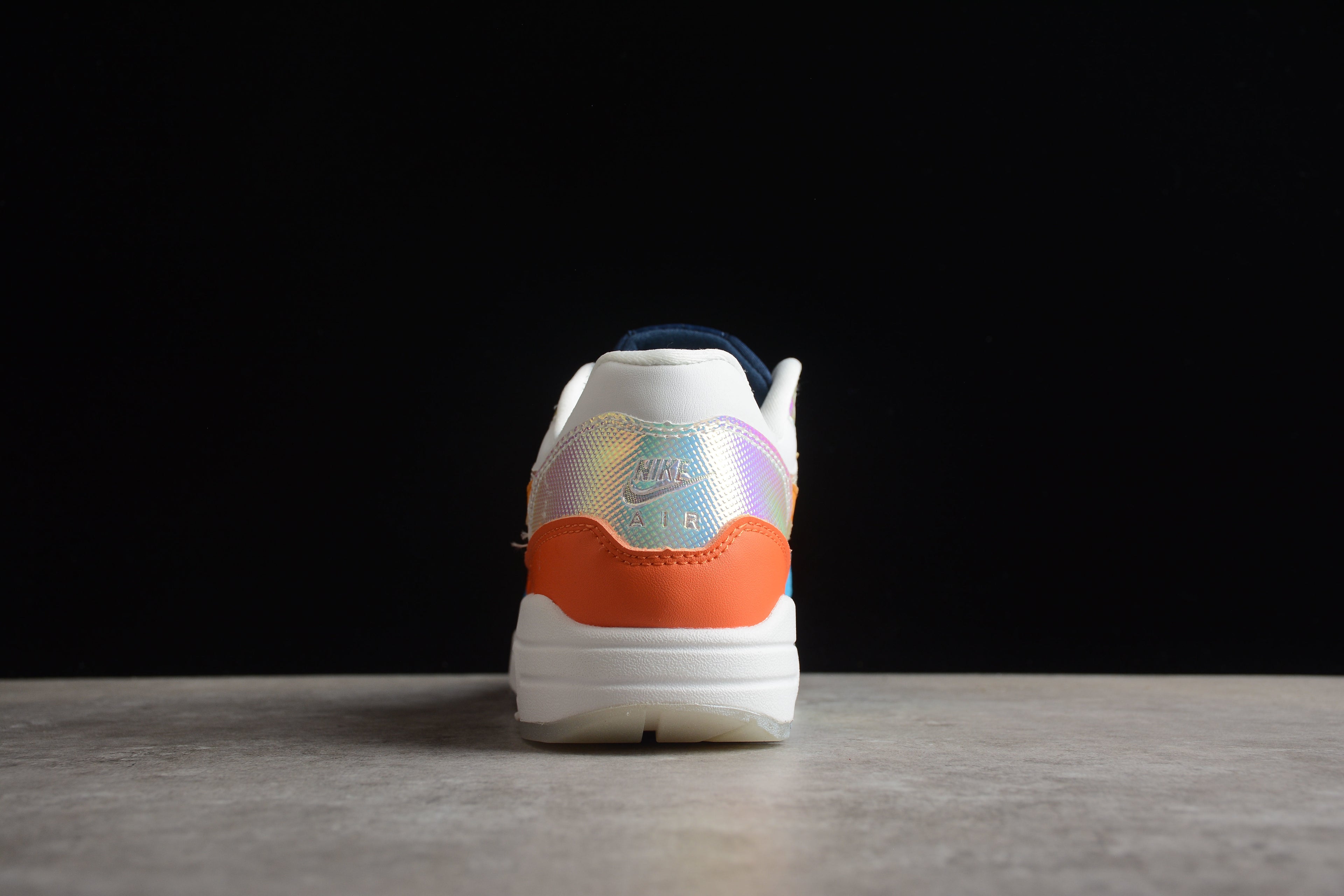 Air Max 1 – Gris / Naranja / Azul