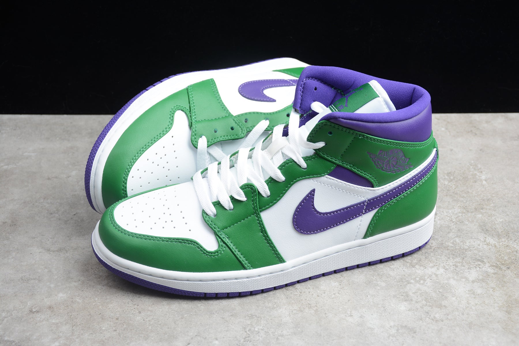 Air Jordan 1 Mid – Verde / Lila