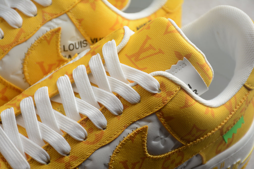 Air Force 1 Low LV – Blanco / Amarillo