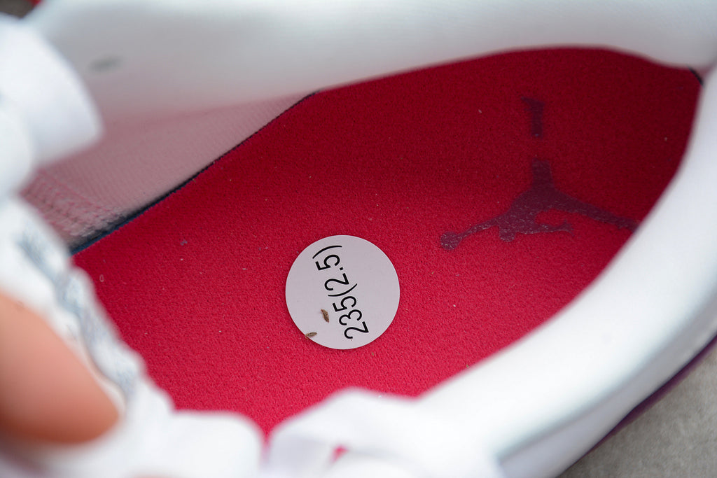 Jordan 1 Low – Blanco / Rosa