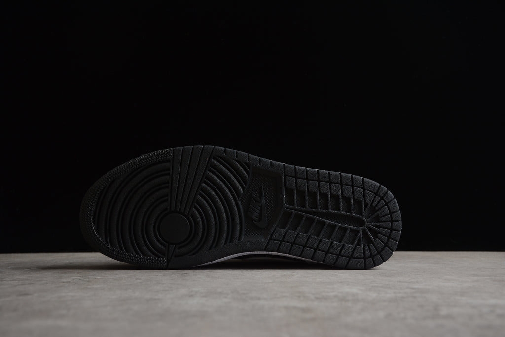 Jordan 1 Low – Negro / Blanco