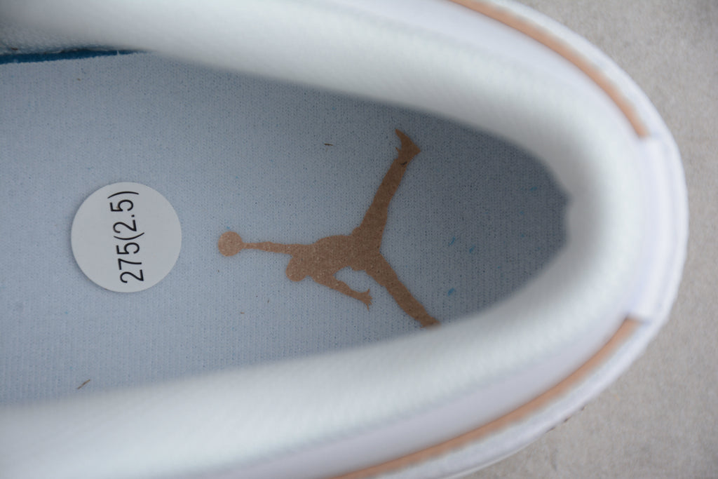 Jordan 1 Low – Blanco / Marrón
