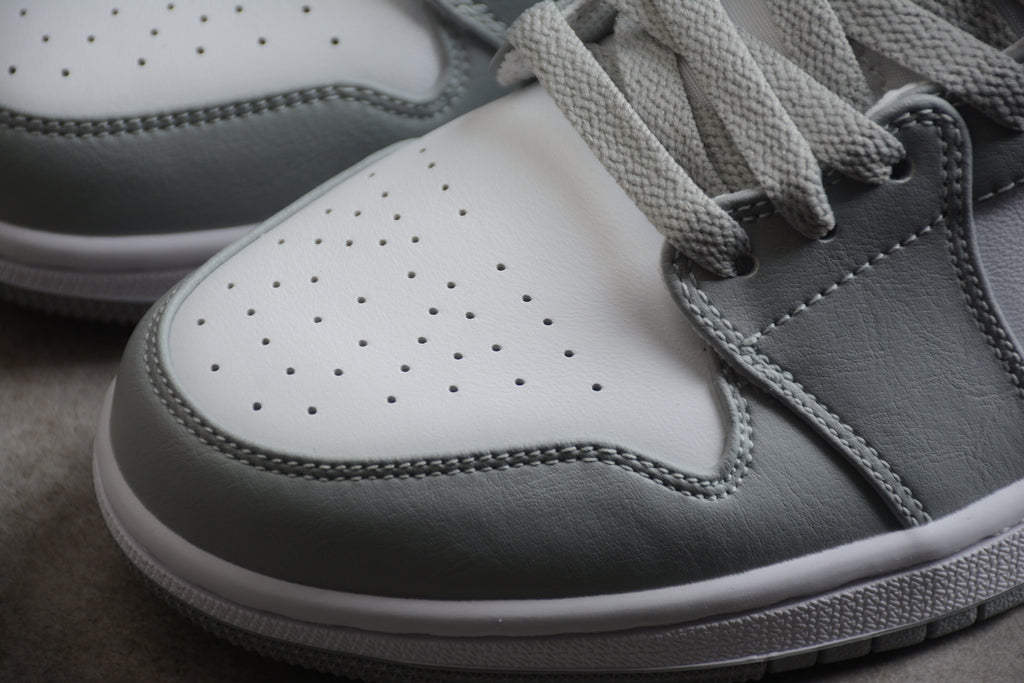Air Jordan 1 Mid – Gris / Blanco
