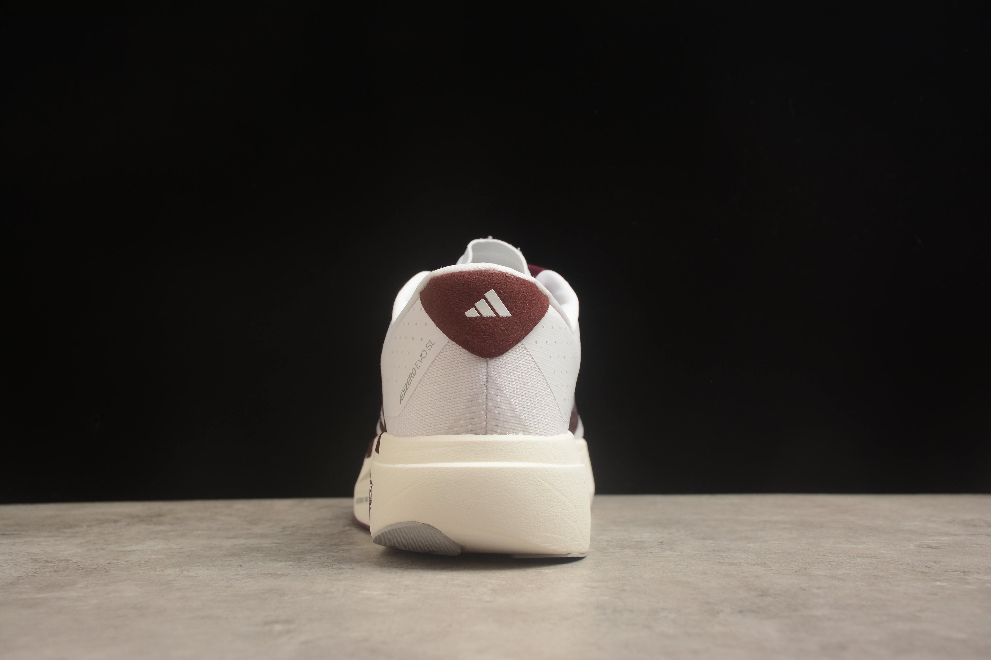 Adidas Adizero Evo SL – Blanco / Marrón