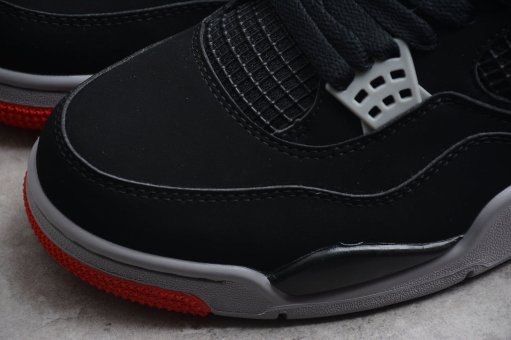 Air Jordan 4 – Negro / Gris / Rojo