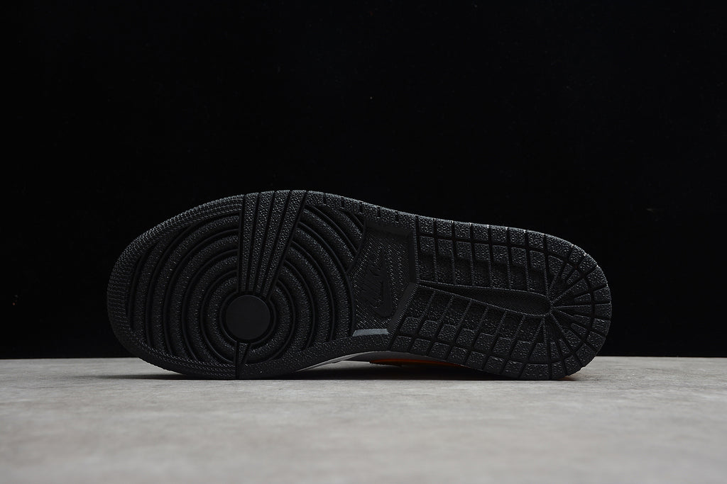 Air Jordan 1 Mid – Amarillo / Blanco / Negro