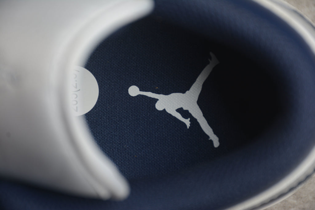 Jordan 1 Low – Azul / Blanco / Gris