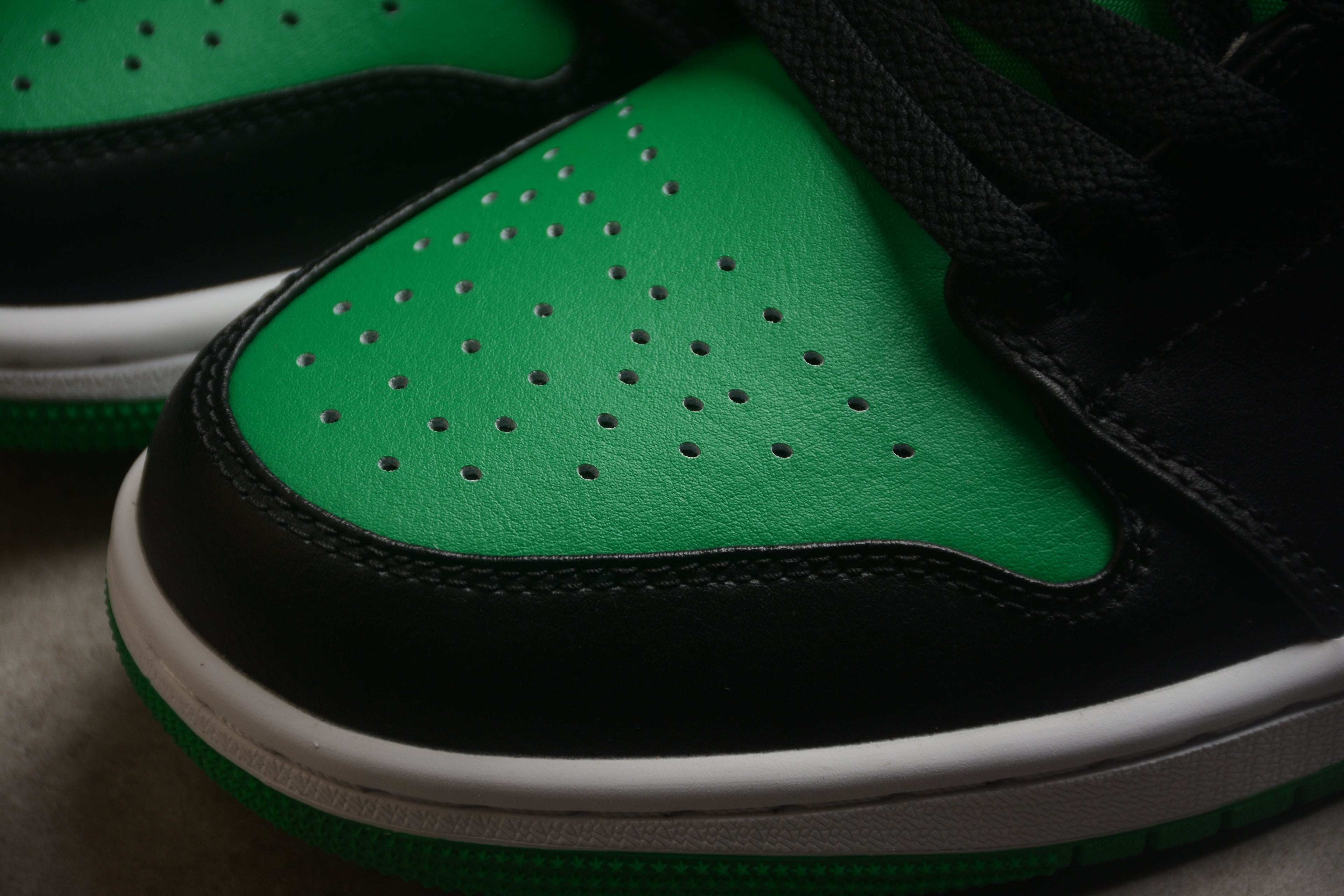 Jordan 1 Low – Verde / Negro