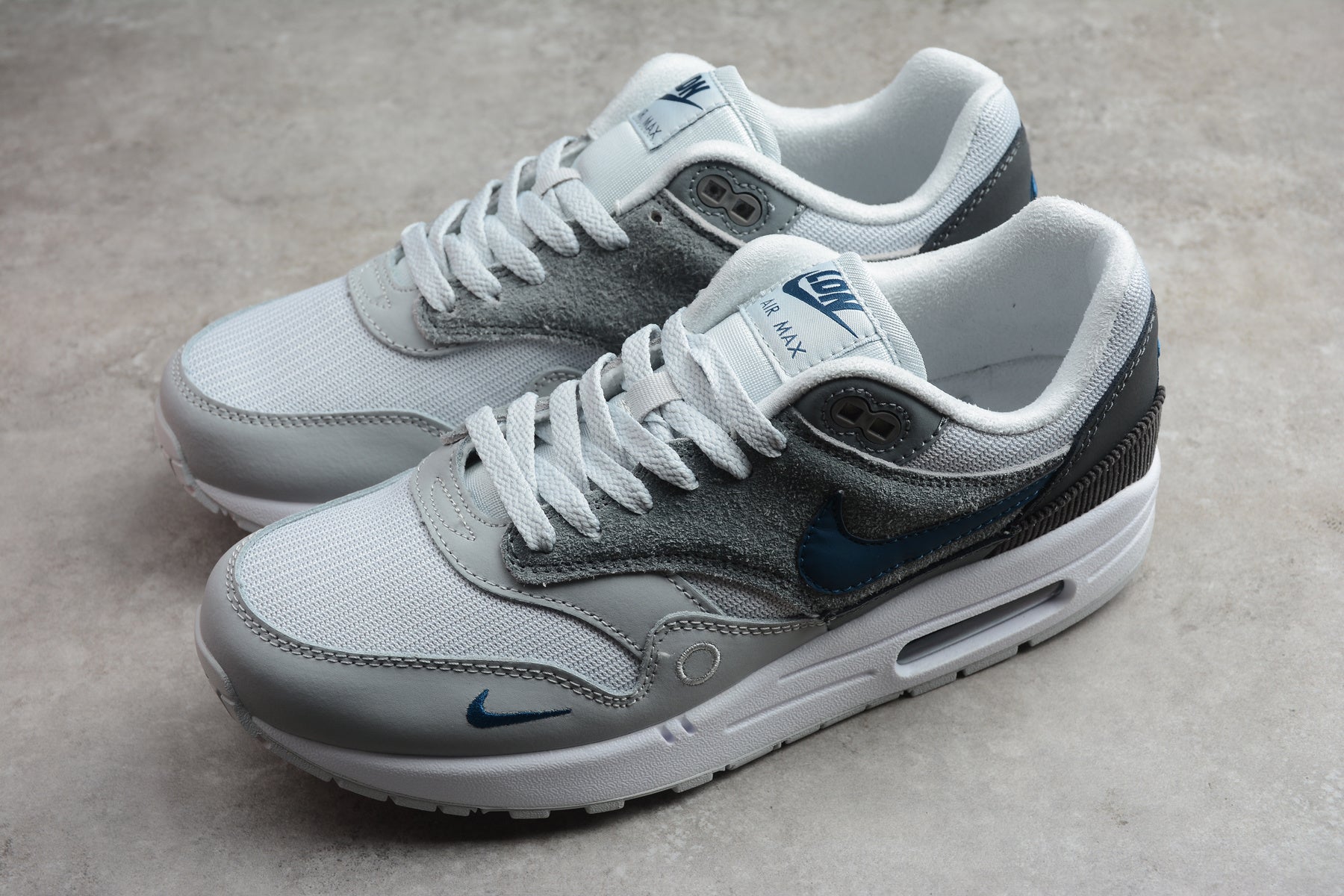 Air Max 1 – Gris / Blanco