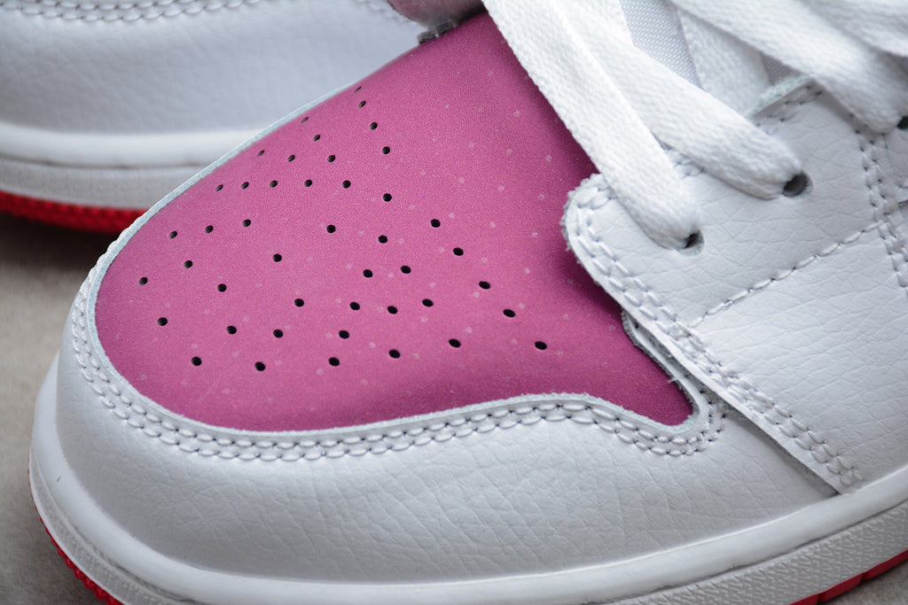 Jordan 1 Low – Blanco / Rosa
