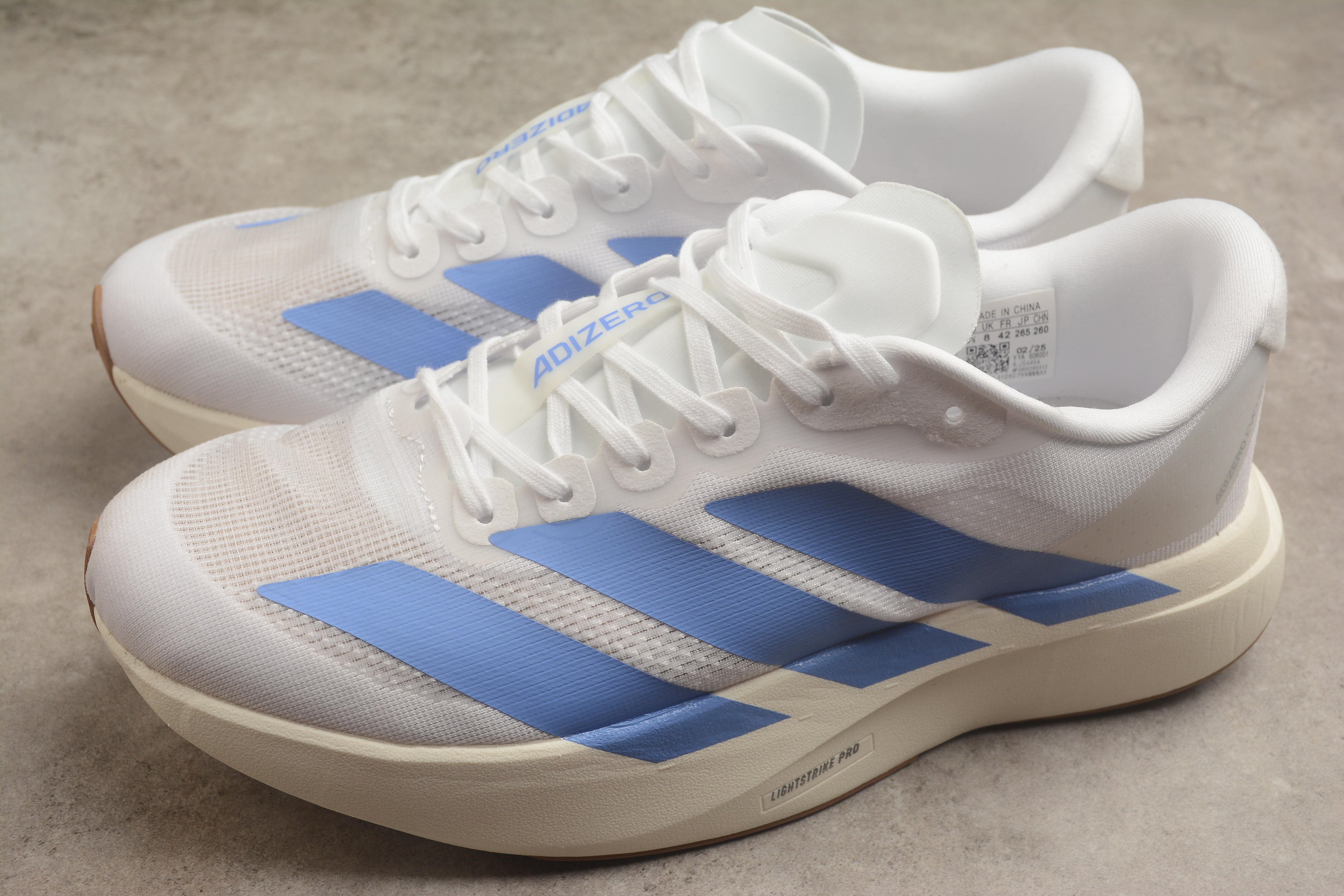 Adidas Adizero Evo SL – Blanco / Azul