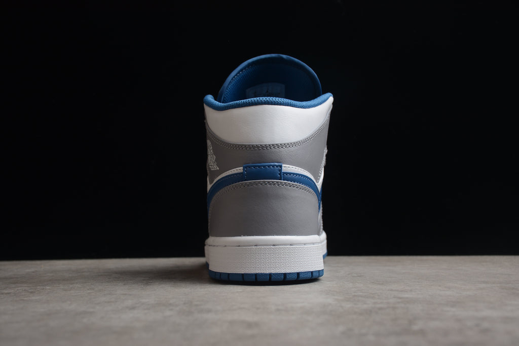 Air Jordan 1 Mid – Blanco / Gris