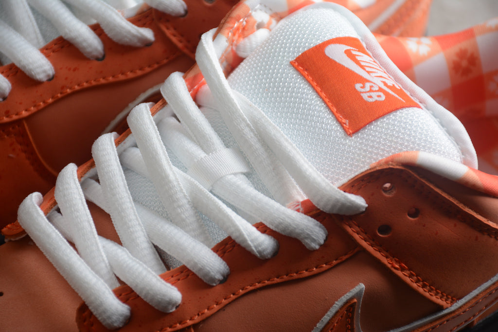 Dunk SB – Naranja / Blanco / Negro